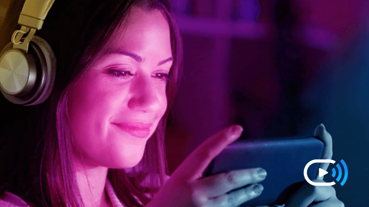 Woman watching FreeCast stream.