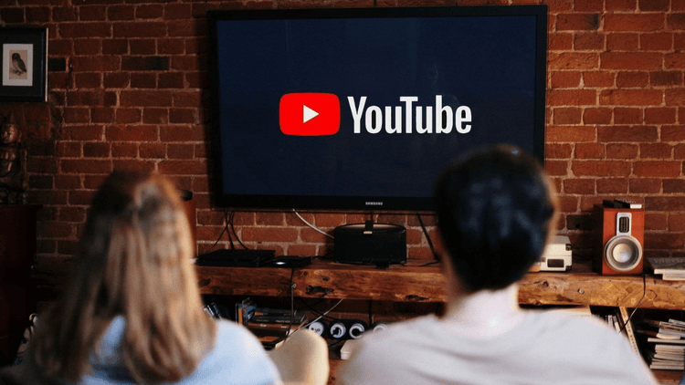 Couple watching Youtube on a TV